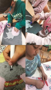 Recortamos tecido e prendemos com muito cuidado nos cortes feitos pela monitora. Pintámos os olhinhos e enfeitamos.